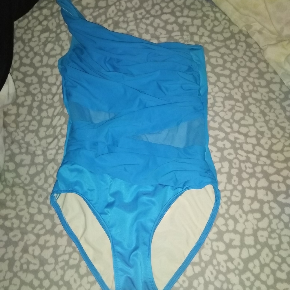 Two Swimsuits and a cover up included